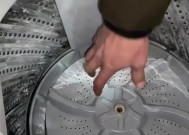 解决伊莱克斯洗衣机显示E1故障的方法（了解E1故障原因及维修建议）