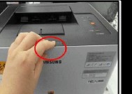 如何处理复印机粉仓漏电问题（有效解决复印机粉仓漏电的方法和注意事项）