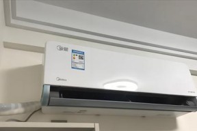 美的空调显示尘满的原因及处理方法（解决美的空调显示尘满问题）