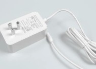 电源为何不设计成适配器形式？这种设计有何优缺点？