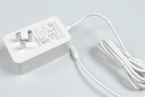 电源为何不设计成适配器形式？这种设计有何优缺点？