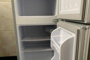 揭秘冰箱上层老是有水的原因（为什么冰箱上层经常有水滴？如何解决这个问题？）