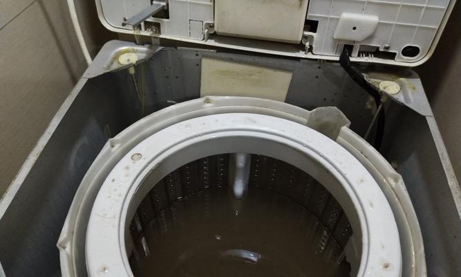 以直桶式洗衣机清洗方法，让你的衣物更干净（简单易行的清洗技巧）  第2张