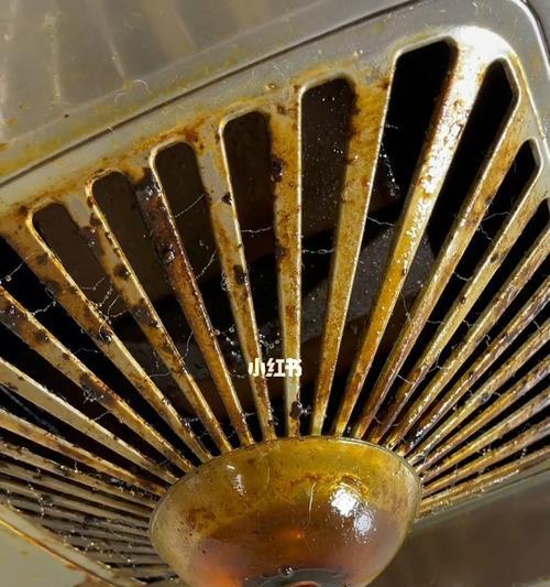 传统的清洗油烟机方法——让油烟机恢复清洁如新（传统清洗方法的有效性和简便操作）  第1张