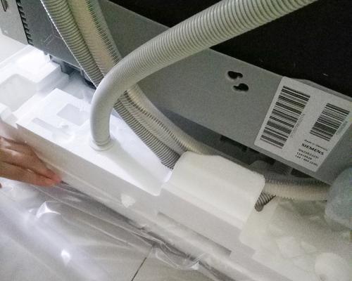 洗碗机排水管处理的有效方法（解决洗碗机排水管问题的简单技巧）  第1张