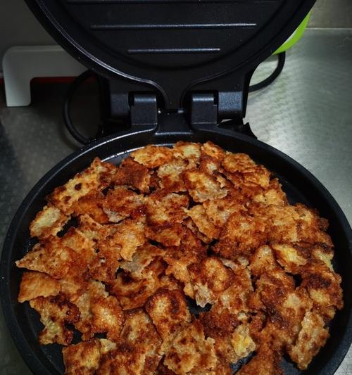 电饭煲锅巴的处理方法（轻松解决电饭煲锅巴困扰）  第2张