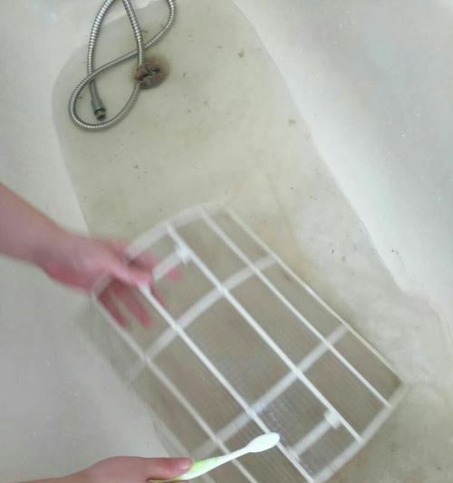 如何巧妙清洗空调滤网（手巧的人都是这样洗——轻松解决空调滤网清洗问题）  第1张