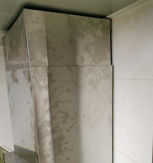 如何处理油烟机上的松螺丝（简单方法解决油烟机螺丝松动问题）  第2张