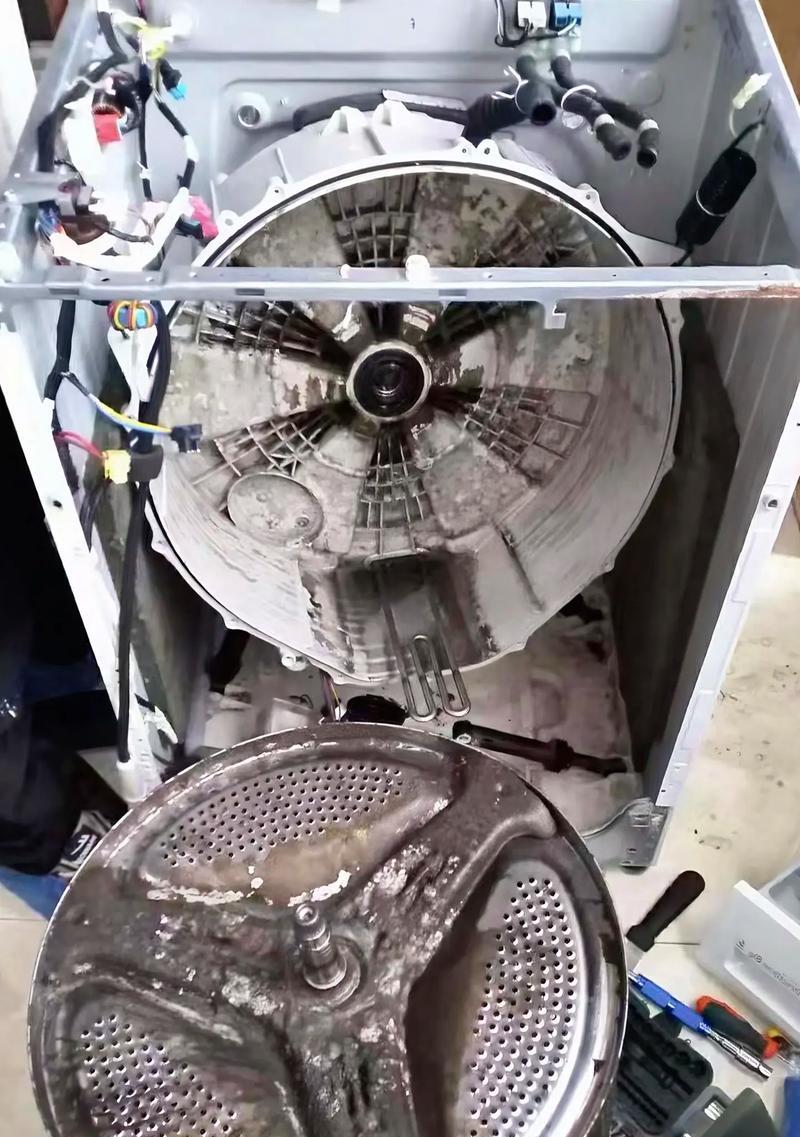 清洗污泥的高效方法——滚筒洗衣机（省力又环保的家庭清洁利器）  第3张